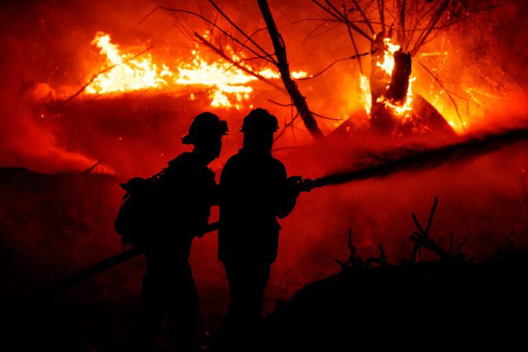 Firefighters battle the Creek Fire in Los Angeles, California on December 5, 2017. Firefighters across Southern California are battling six major fires that are fueled by strong Santa Ana winds with wind gusts of 70 miles per hour